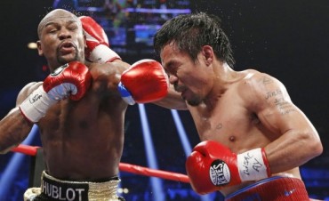 Mayweather gana el &lsquo;combate del siglo&rsquo;
